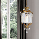 Vintage Crystal Prism Drum Pendant Light with Gold Scroll Frame - 3-Light Hanging Chandelier for Living Room - This modern crystal chandelier is the perfect light fixture to add a touch of elegance to any room. The round canopy and clear shade are made of high